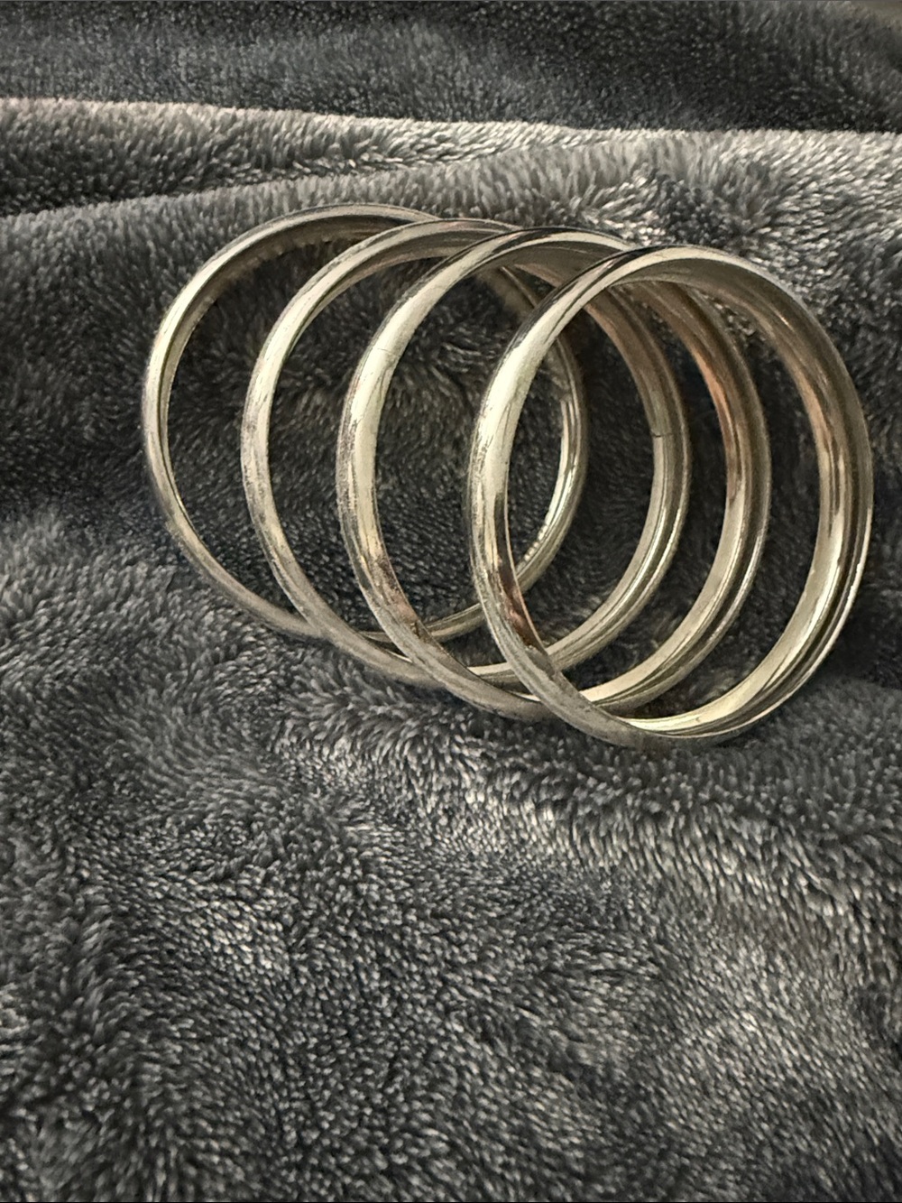 Set of Five Silver Tone Metal Bangles
